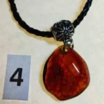 Кулоны подвески из янтаря на шнурке