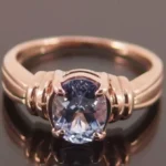 Кольцо красное золотое с Танзанитом